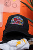 Black cap with 'Music City USA' patch on an orange background