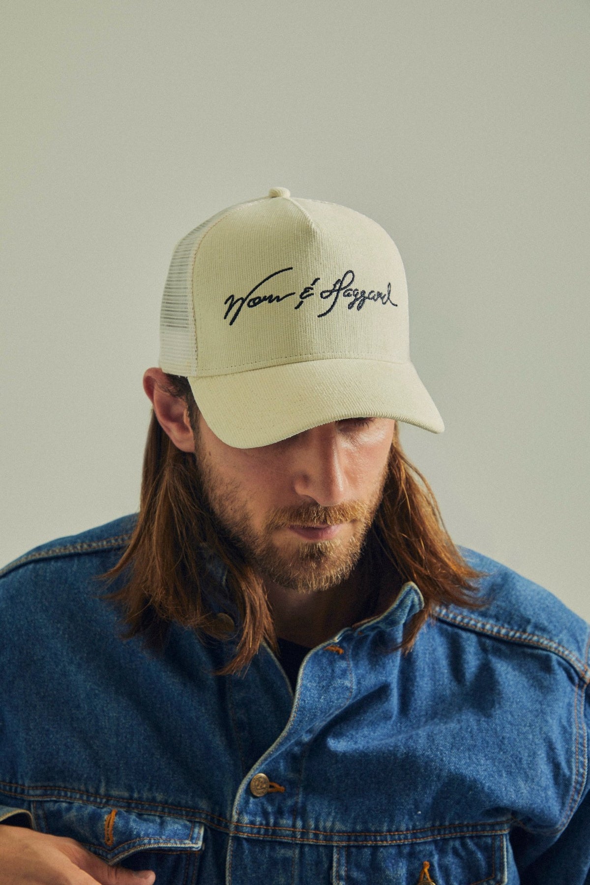 Signature Ivory Trucker Hat Worn Haggard